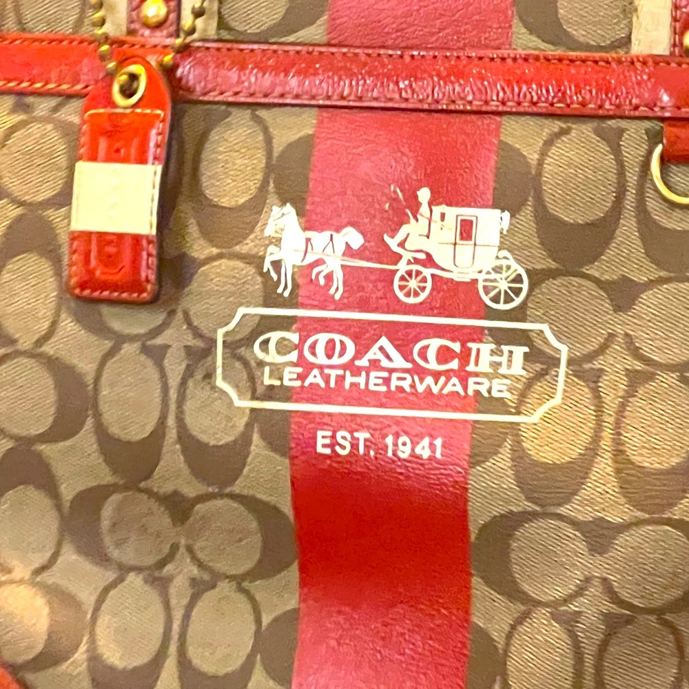 Coach tote with coach symbols and leather